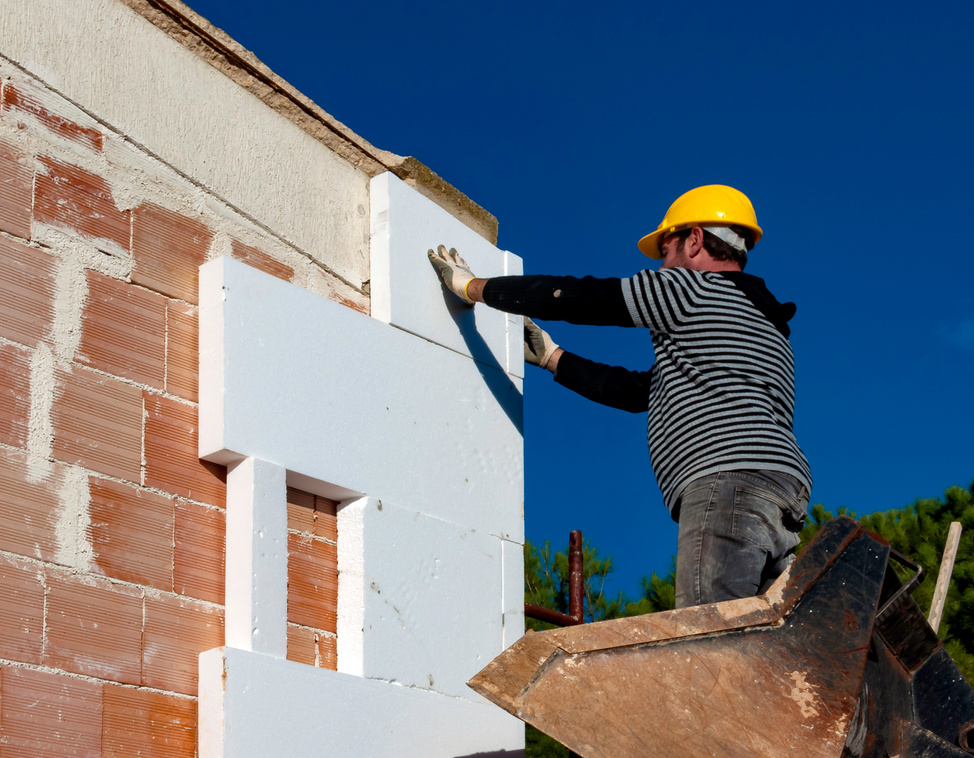 Construction site - Installing external insulation Facade therm